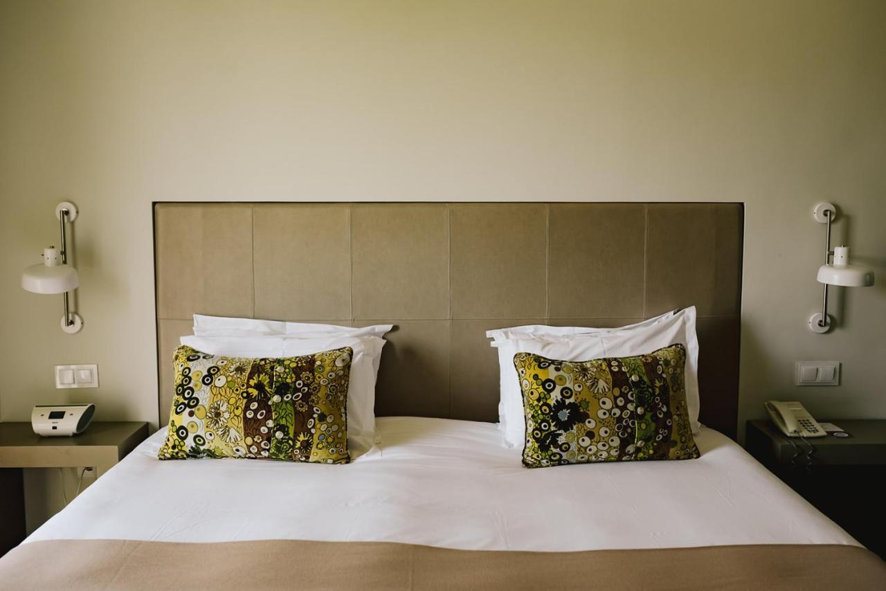 Hotel M'AR De AR Aqueduto Évora Exterior foto A bed with a headboard